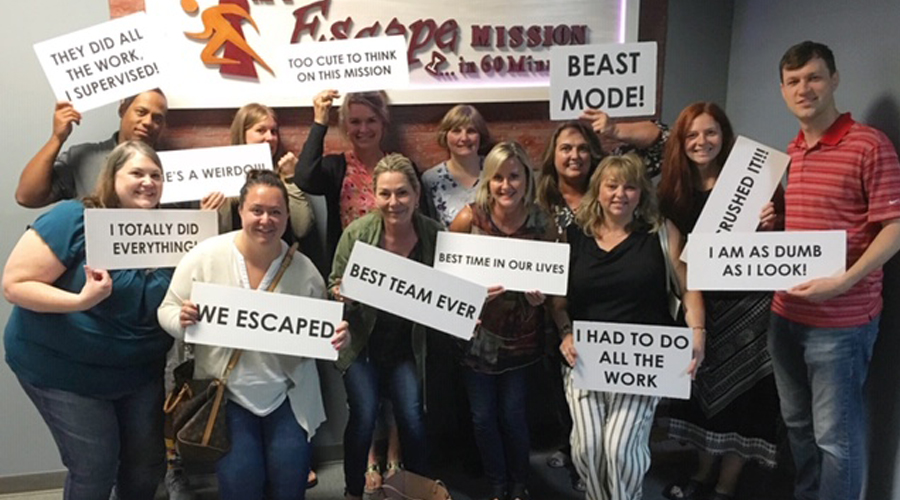 CUES staff team bonding in an escape room